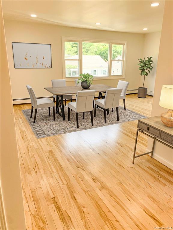 5 Ridge Road, Unit 2 Dobbs Ferry, NY 10522 - Photo 2 of 18 a living room with furniture and a large window