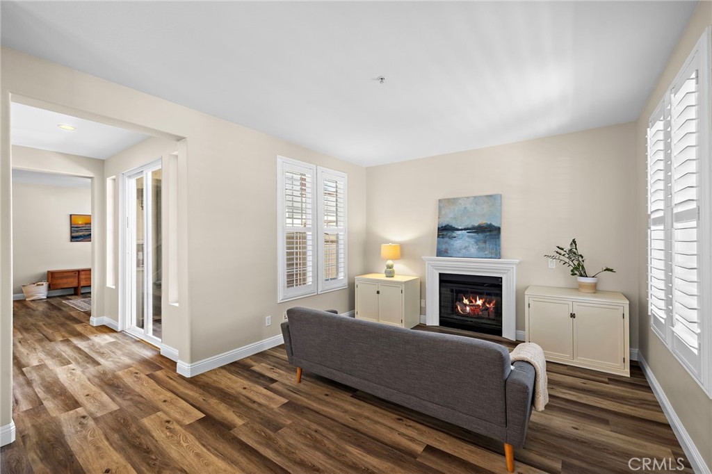 71 Sklar Street Ladera Ranch, CA 92694 - Photo 9 of 55 a living room with furniture and a fireplace
