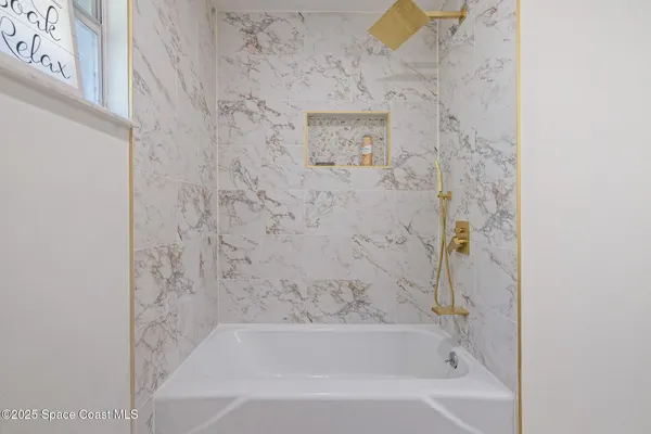 a bathroom with a bathtub