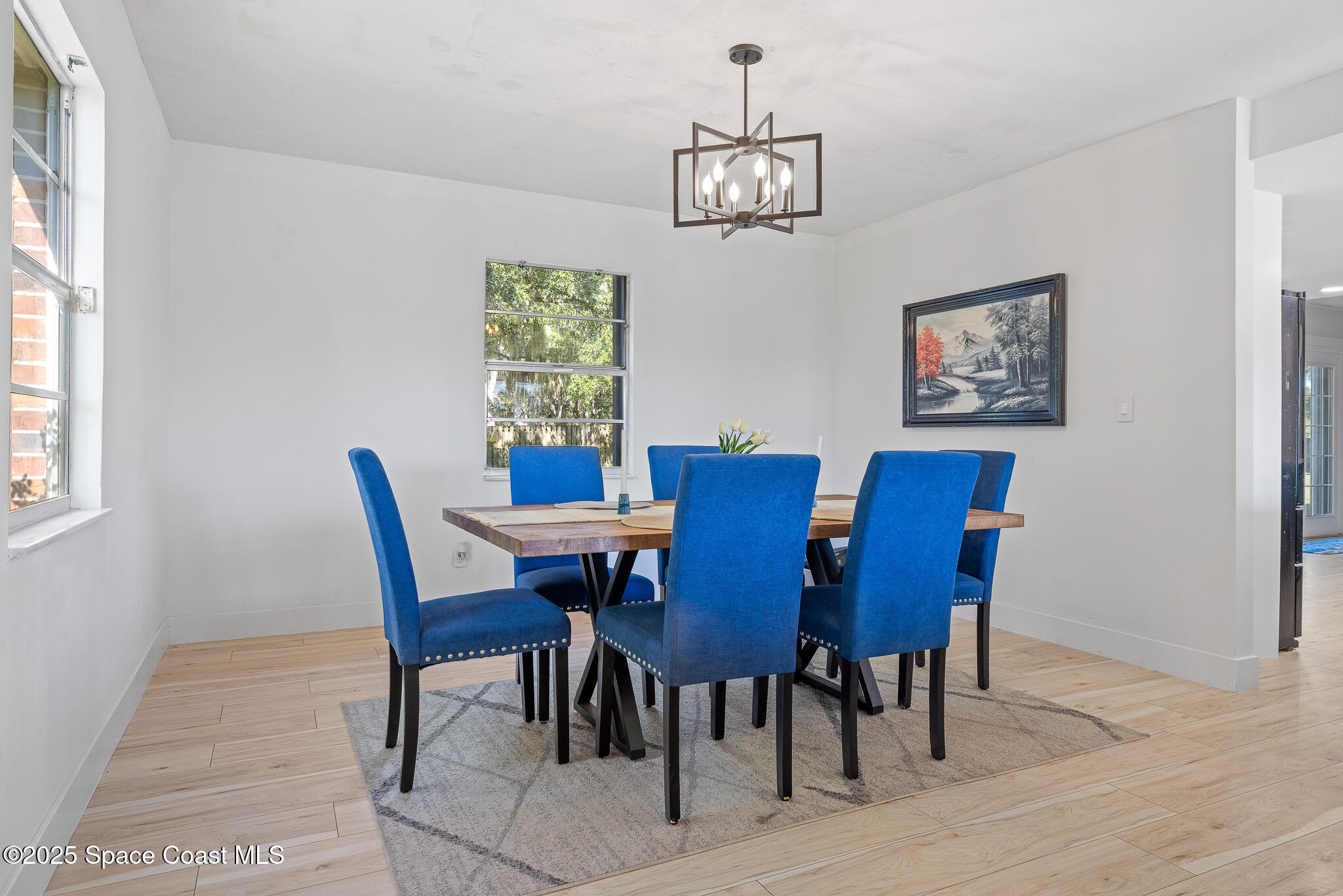 1274 Cimarron Circle Northeast Palm Bay, FL 32905 - Photo 8 of 37 a view of a dining room with furniture