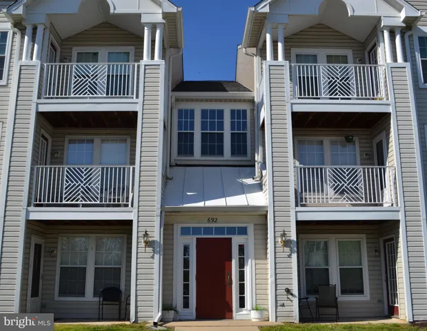 a front view of a house with glass door