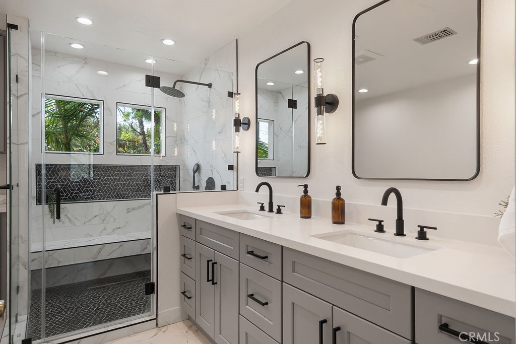 235 Spinks Canyon Road Duarte, CA 91010 - Photo 37 of 62 a bathroom with a double vanity sink mirror and double