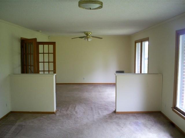 5366 Mansford Road Winchester, TN 37398 - Photo 2 of 11 an empty room with windows