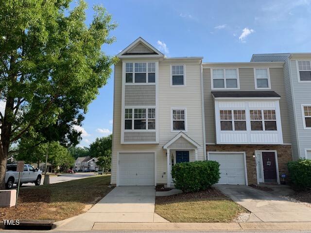 4910 Briarstone Court Raleigh, NC 27610 - Photo 2 of 34 End unit 3 story w/garage 3 bedroom, 2 full baths, 2 half baths