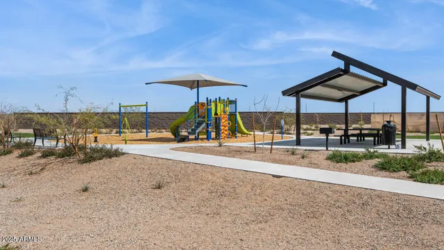 a view of a park with a slide