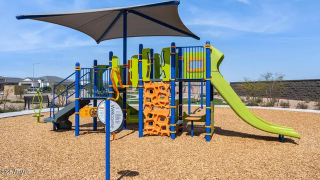 a view of a park with a slide