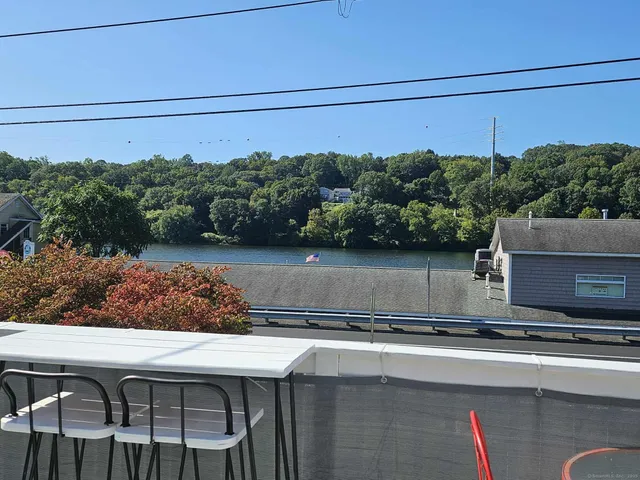 a view of a city street from a balcony
