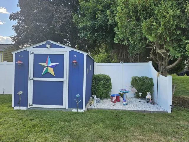 a front view of a house with yard