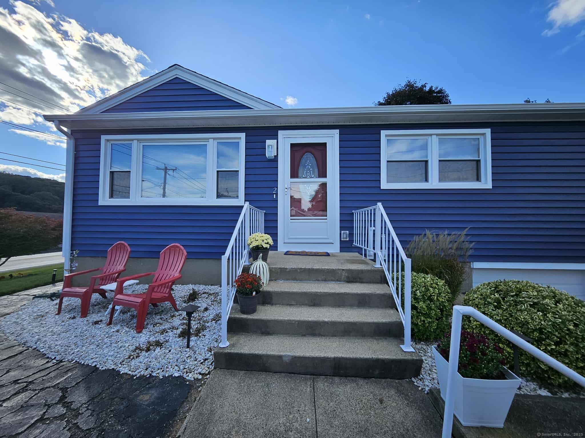 2 F Street Derby, CT 06418 - Photo 28 of 28 a view of a brick house with chairs and wooden fence