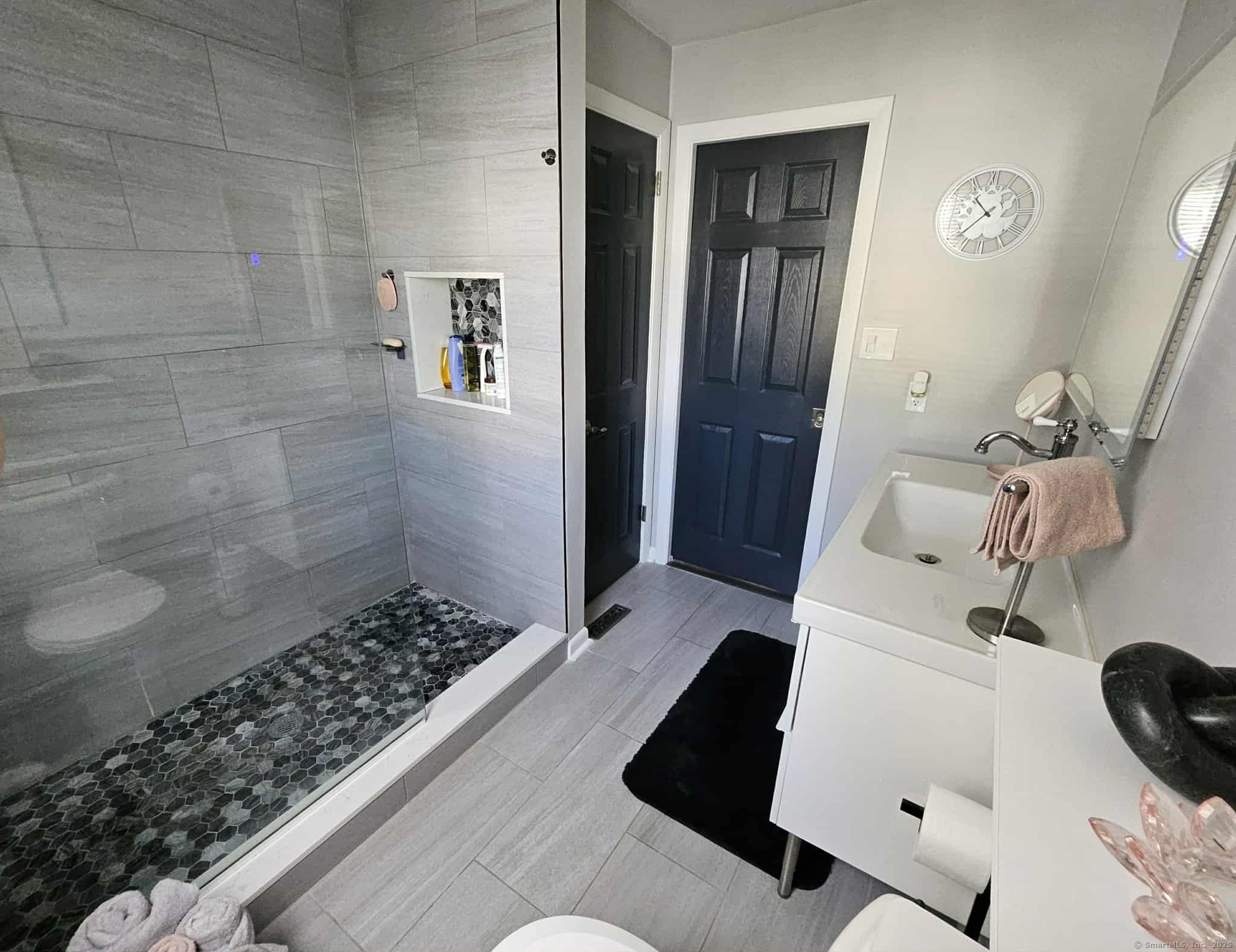 2 F Street Derby, CT 06418 - Photo 9 of 28 a bathroom with a sink and a shower