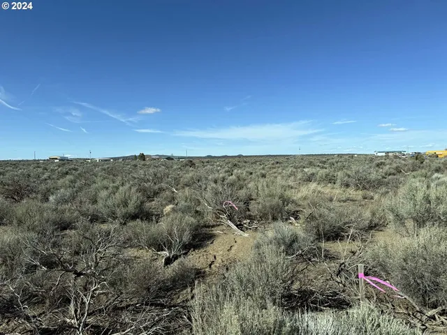 a view of a sky from a field