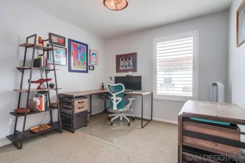 a room with furniture and a window