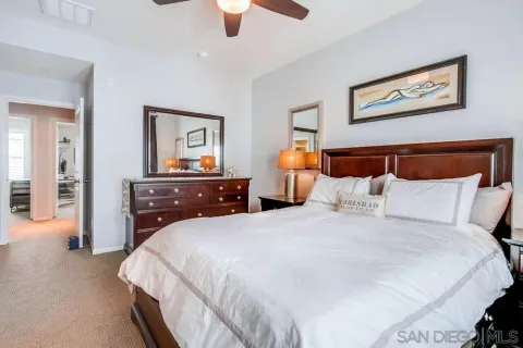 a bathroom with a double vanity sink mirror and shower