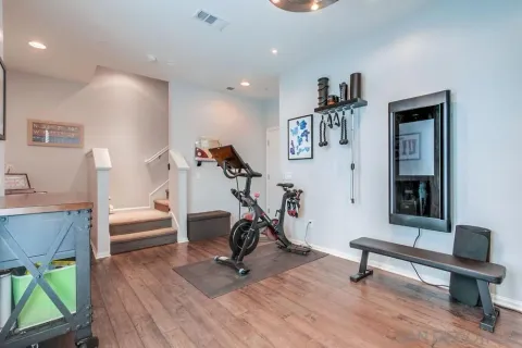 a view of entryway with workspace and stairs