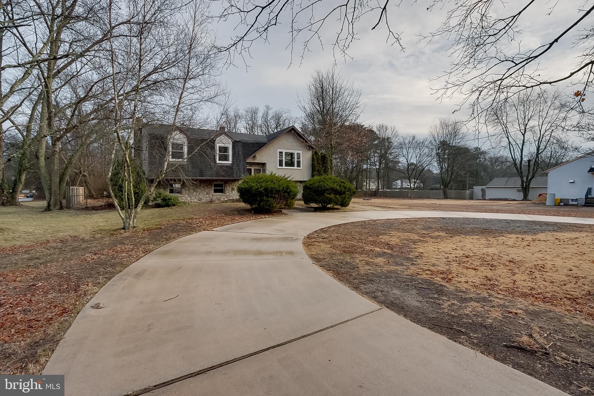 2430 Hopewell Road Berlin, NJ 08009 - Photo 1 of 30 a front view of a house with a yard