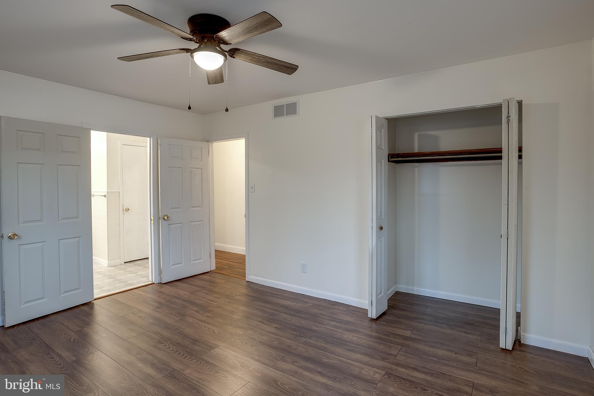2430 Hopewell Road Berlin, NJ 08009 - Photo 12 of 30 a view of an empty room with wooden floor