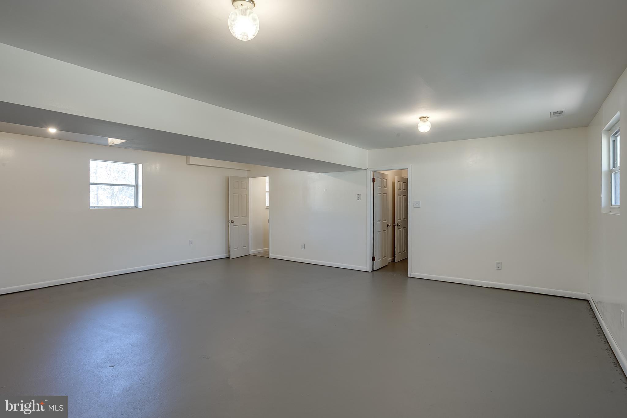 2430 Hopewell Road Berlin, NJ 08009 - Photo 20 of 30 an empty room with a empty space and windows