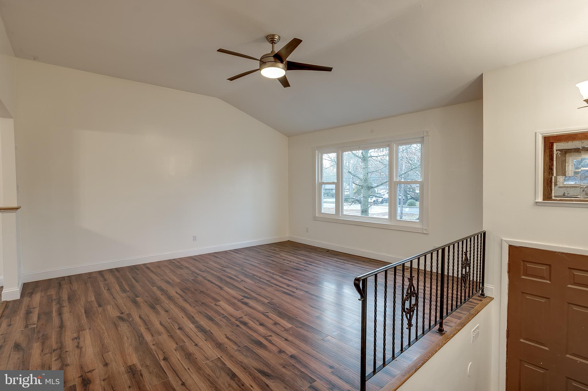2430 Hopewell Road Berlin, NJ 08009 - Photo 6 of 30 a view of empty room with wooden floor and fan