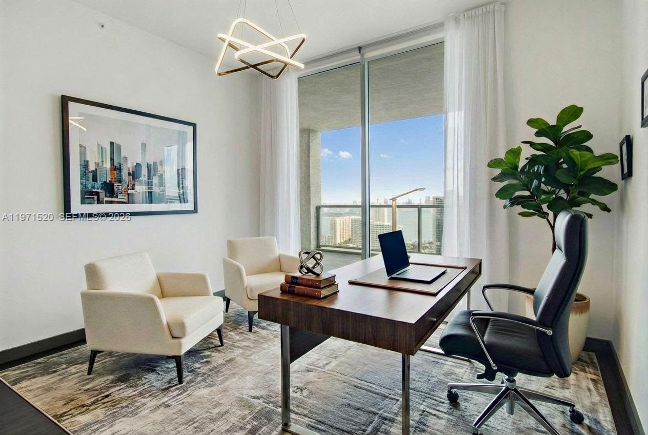 1050 Brickell Avenue, Unit 3406 Miami, FL 33131 - Photo 12 of 20 a view of a workspace with furniture