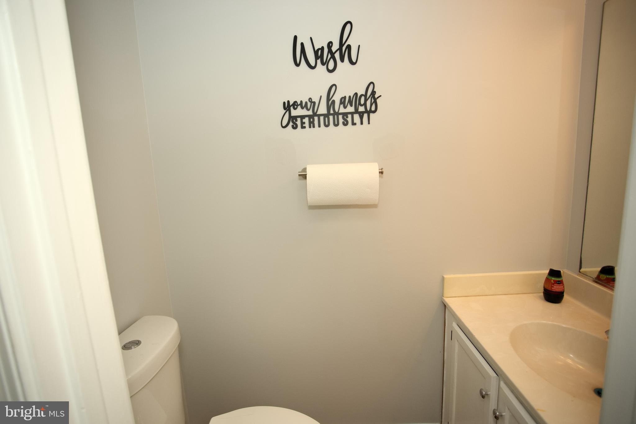 8553 Ritchboro Road District Heights, MD 20747 - Photo 13 of 29 half bath on main level