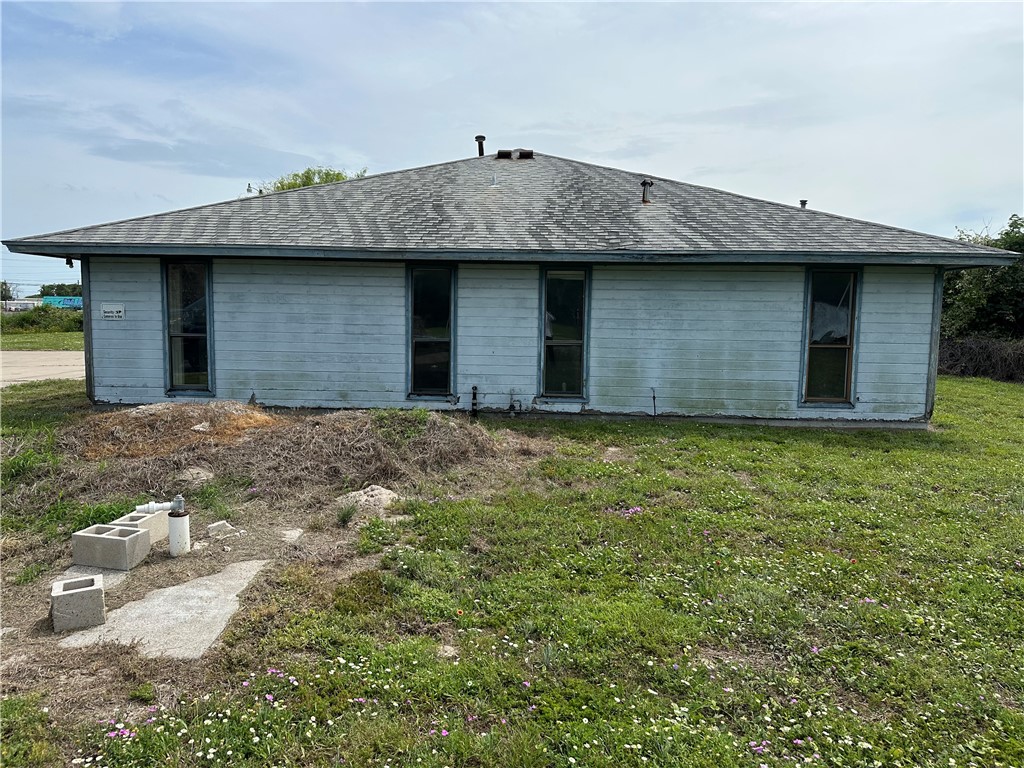 417 Linnet Courts Corpus Christi, TX 78418 - Photo 1 of 20 a view of a stone house with a outdoor space