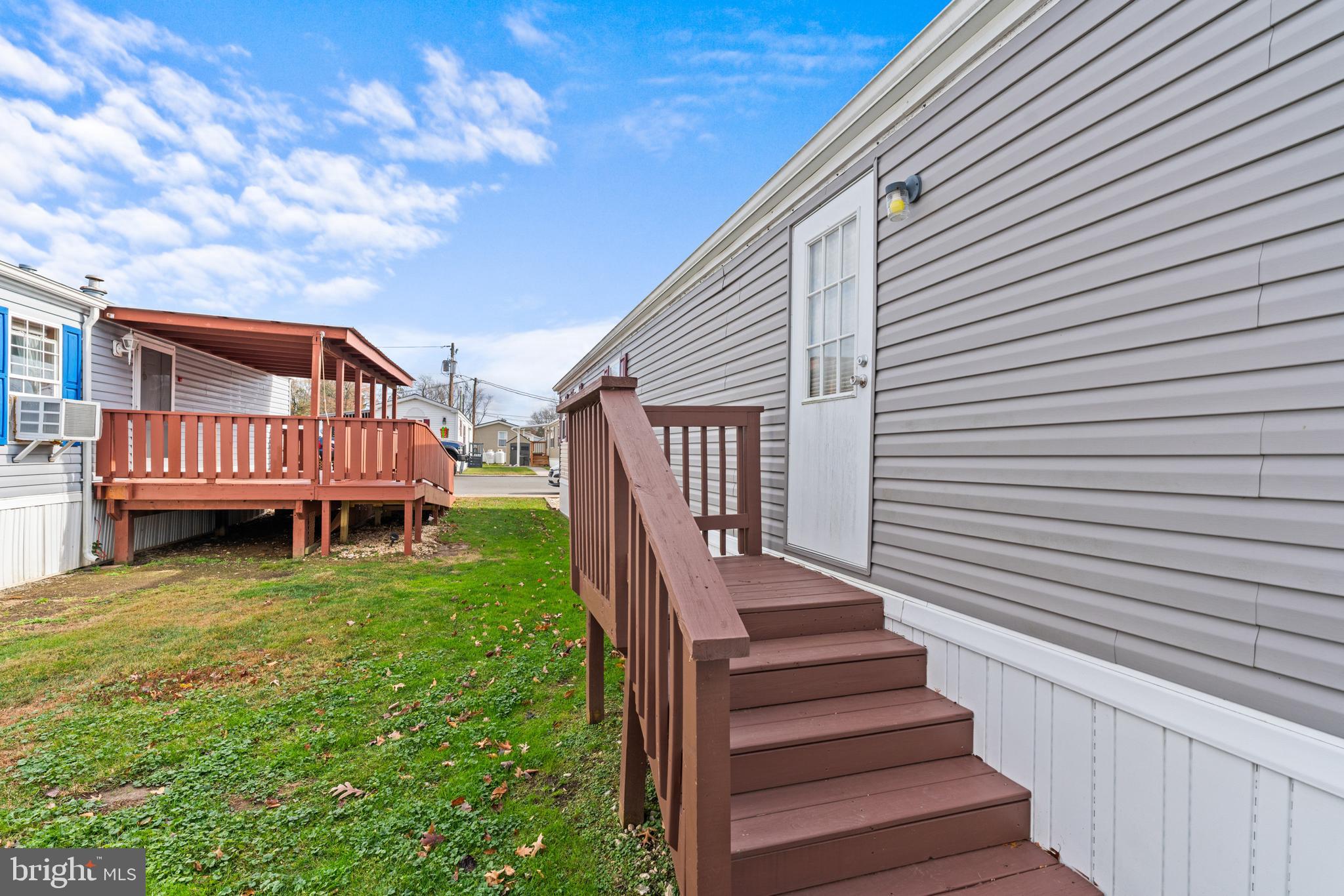 525 Canter Road Wilmington, DE 19810 - Photo 14 of 14 a view of a house with backyard and deck