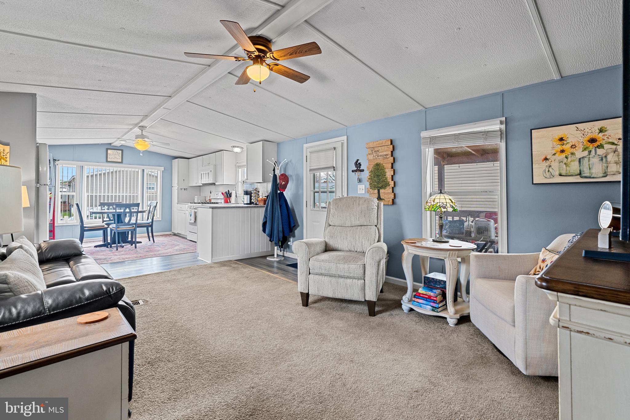 525 Canter Road Wilmington, DE 19810 - Photo 6 of 14 a living room with furniture and a flat screen tv