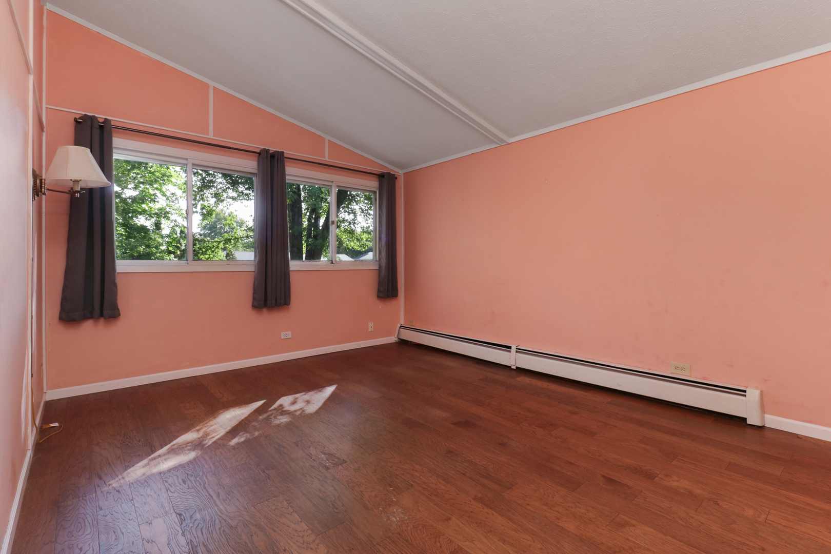 314 South Maple Avenue Minier, IL 61759 - Photo 14 of 30 a view of an empty room with wooden floor and a window