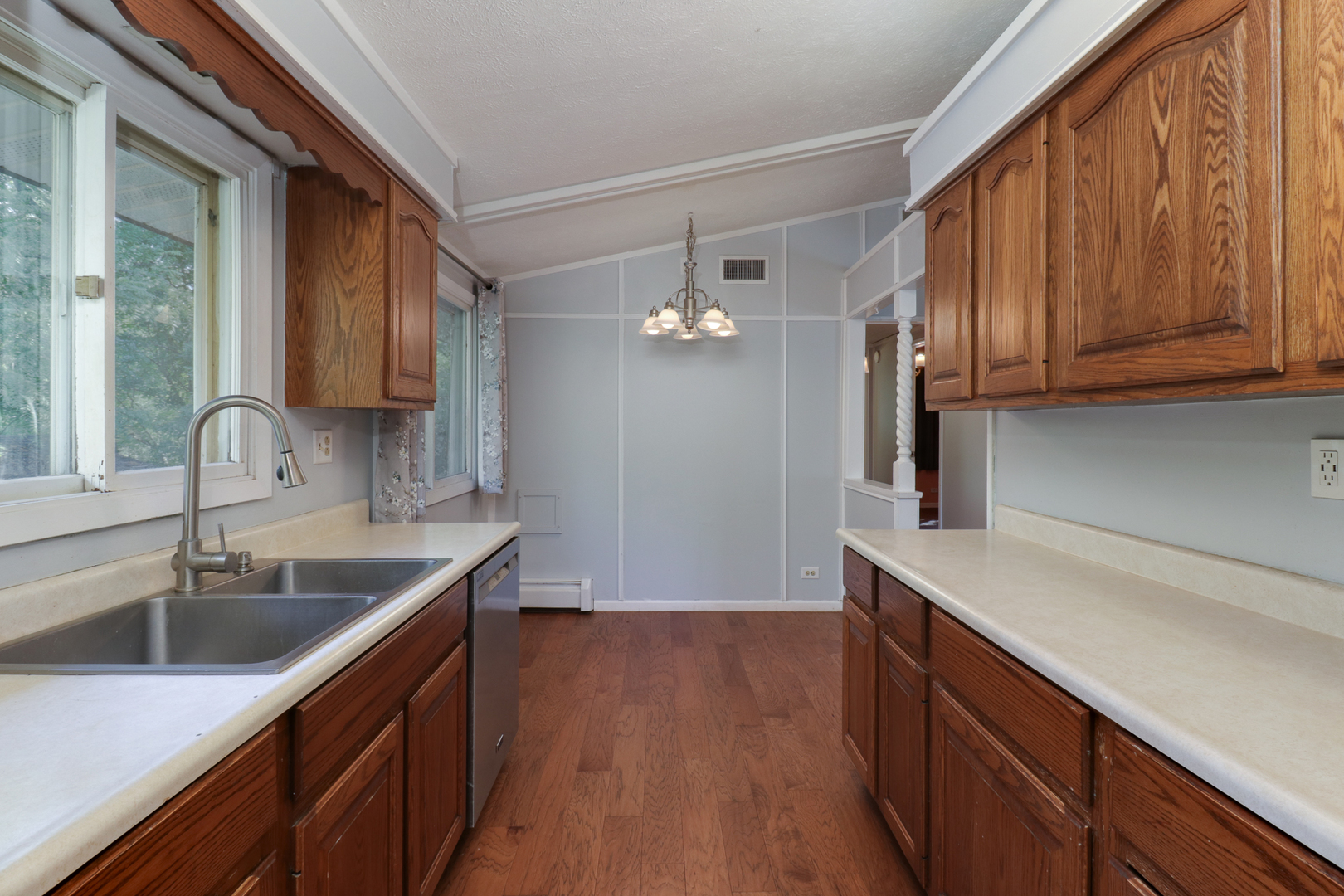 314 South Maple Avenue Minier, IL 61759 - Photo 10 of 30 a kitchen with a sink cabinets and wooden floor