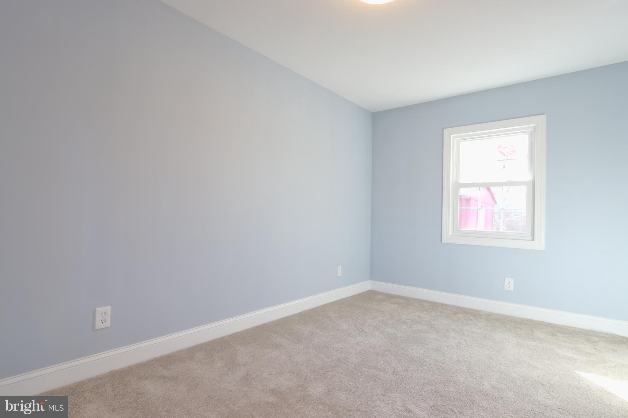 6016 Backlick Road Springfield, VA 22150 - Photo 19 of 24 an empty room with a window