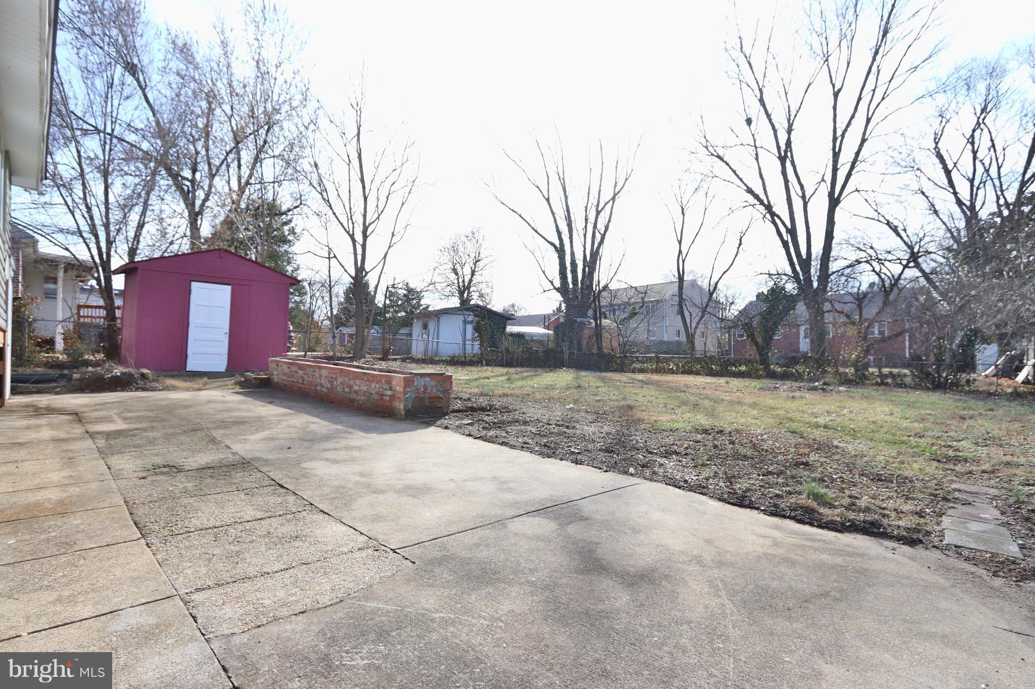 6016 Backlick Road Springfield, VA 22150 - Photo 23 of 24 a view of backyard with large trees