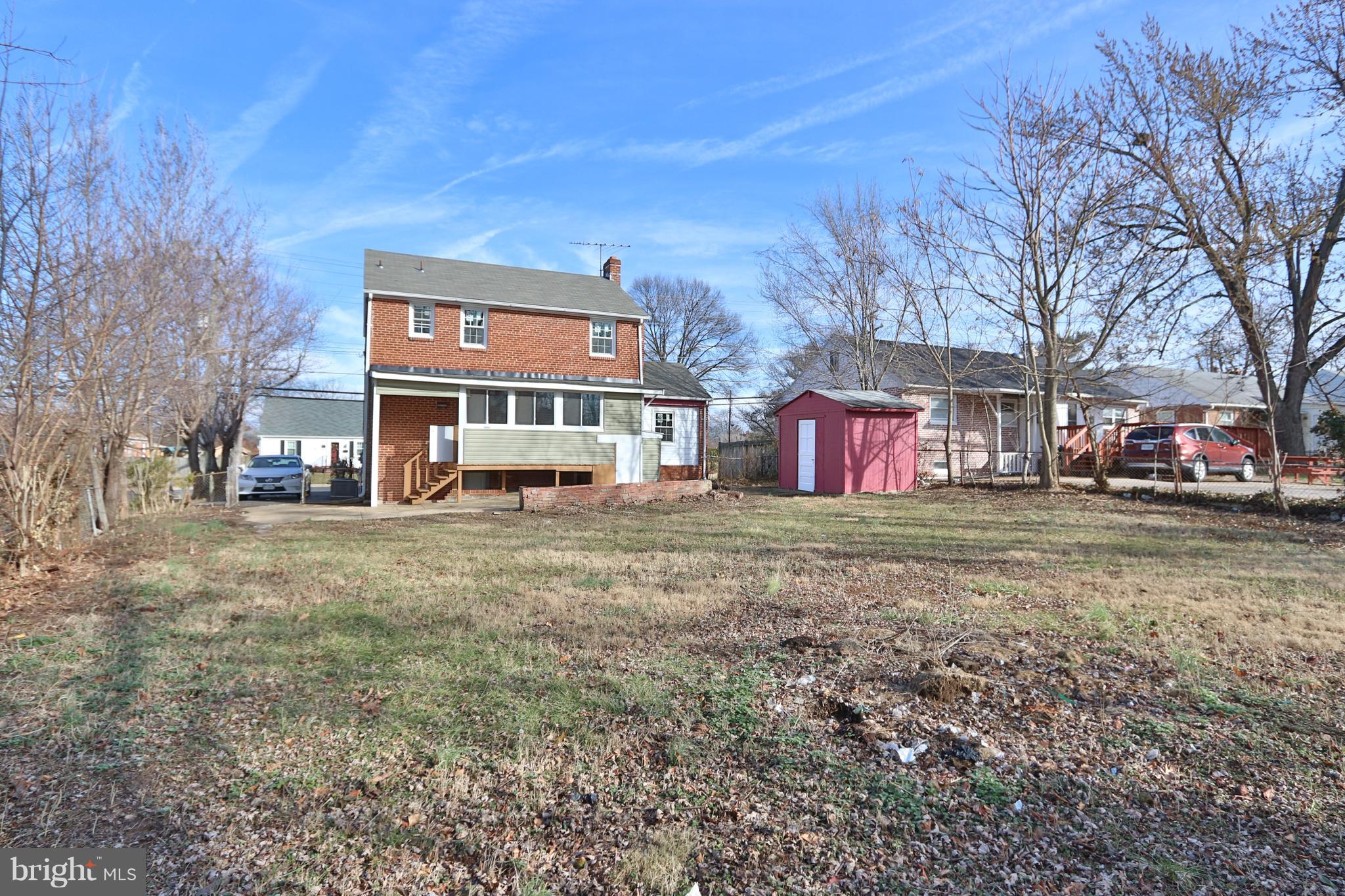 6016 Backlick Road Springfield, VA 22150 - Photo 24 of 24 a front view of a house with a yard