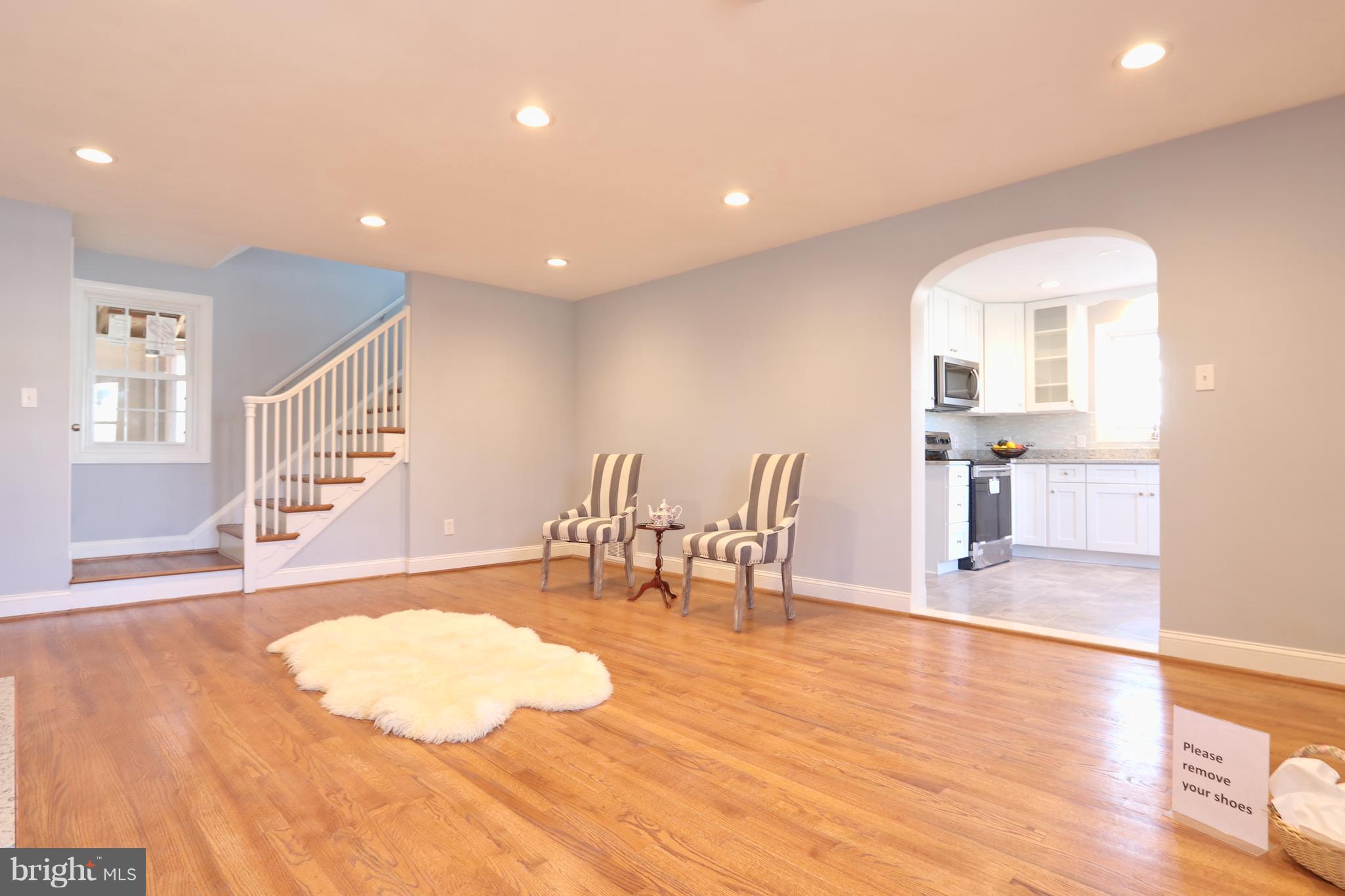 6016 Backlick Road Springfield, VA 22150 - Photo 7 of 24 a view of dining room with furniture and wooden floor