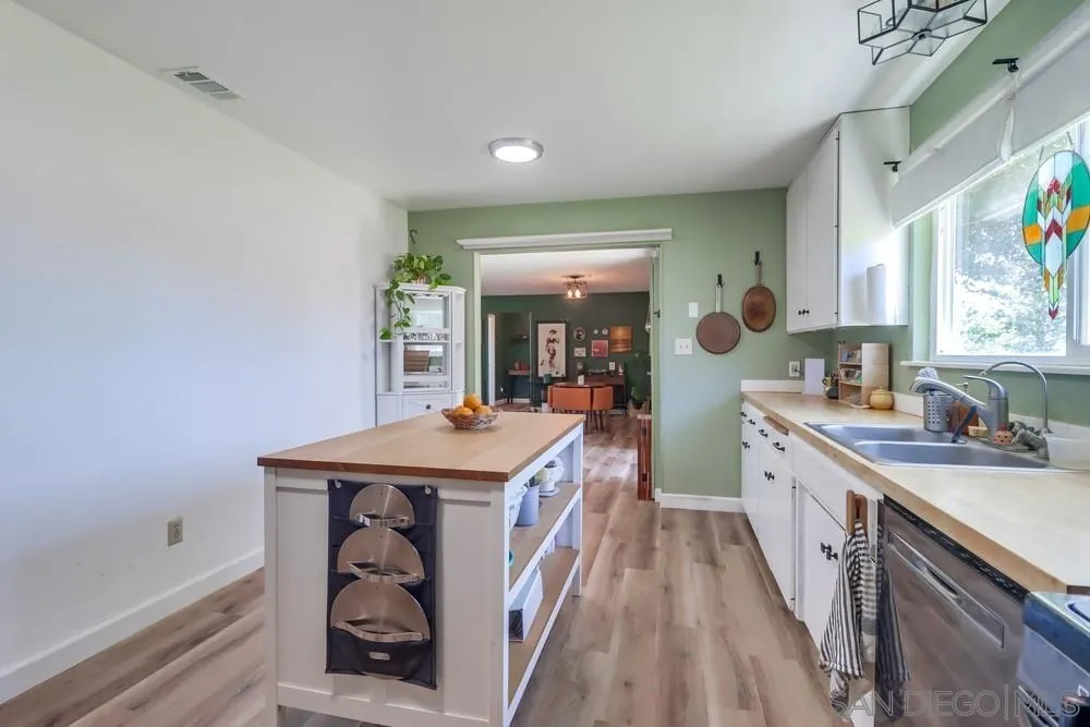 2920 Ribbonwood Road Boulevard, CA 91905 - Photo 22 of 65 a kitchen with a sink and cabinets