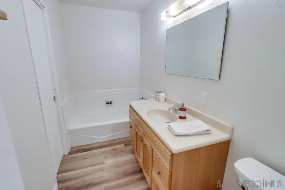 2920 Ribbonwood Road Boulevard, CA 91905 - Photo 24 of 65 a bathroom with a sink and a mirror