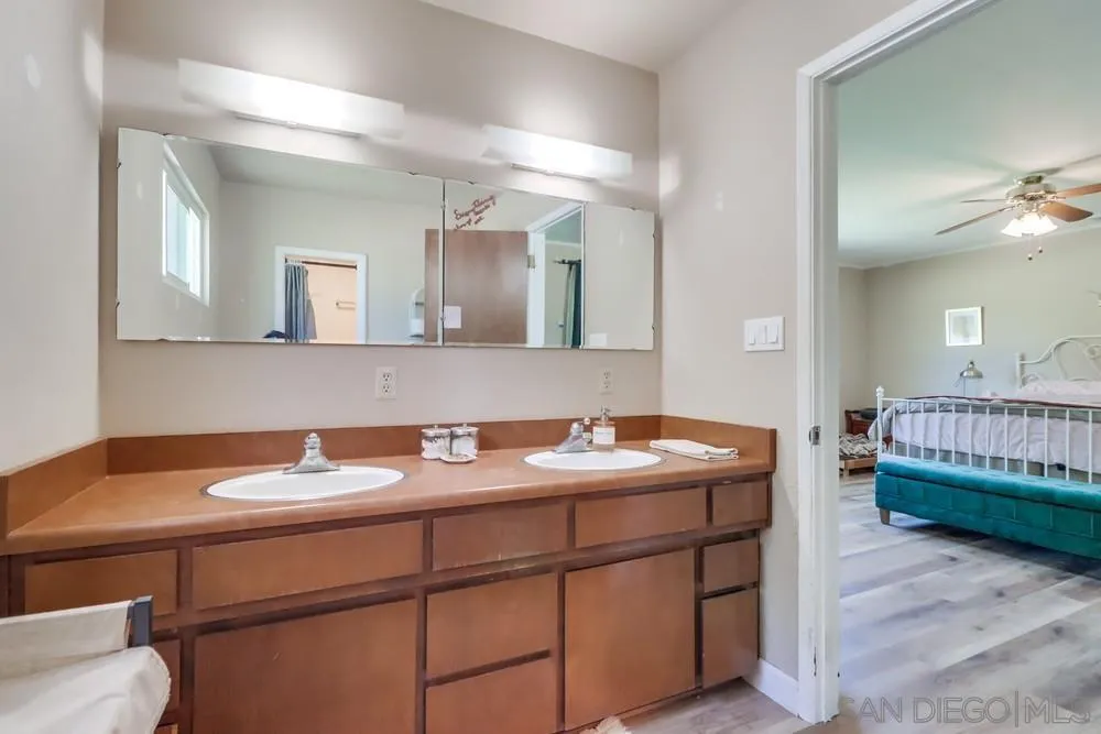 2920 Ribbonwood Road Boulevard, CA 91905 - Photo 33 of 65 a bathroom with a sink and a mirror