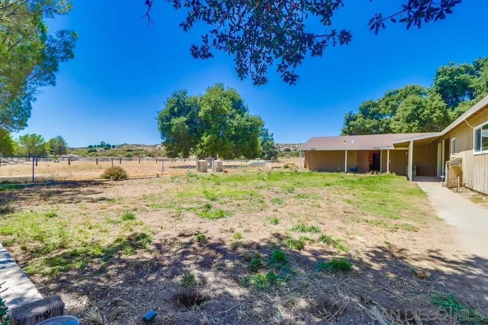 2920 Ribbonwood Road Boulevard, CA 91905 - Photo 48 of 65 a backyard of a house with a garden