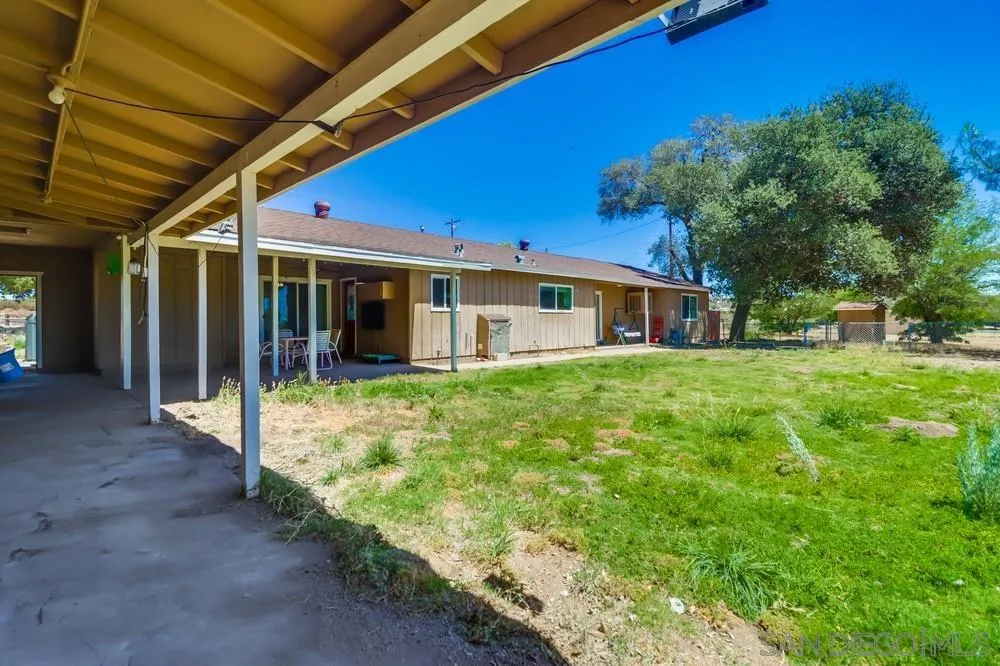 2920 Ribbonwood Road Boulevard, CA 91905 - Photo 54 of 65 a view of a house with backyard and porch