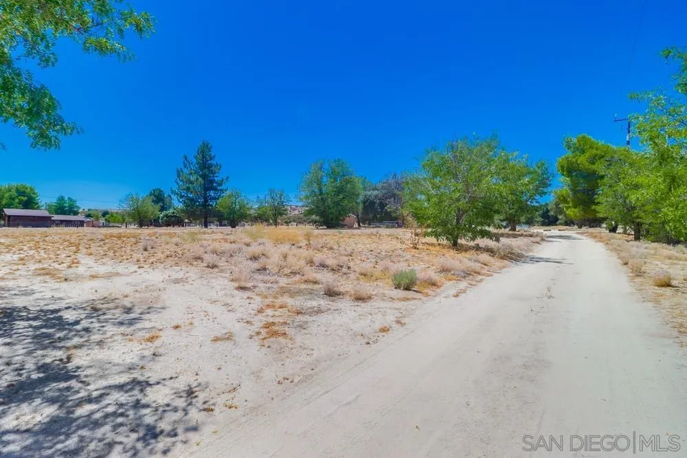 2920 Ribbonwood Road Boulevard, CA 91905 - Photo 60 of 65 a wooden bench with beach in background