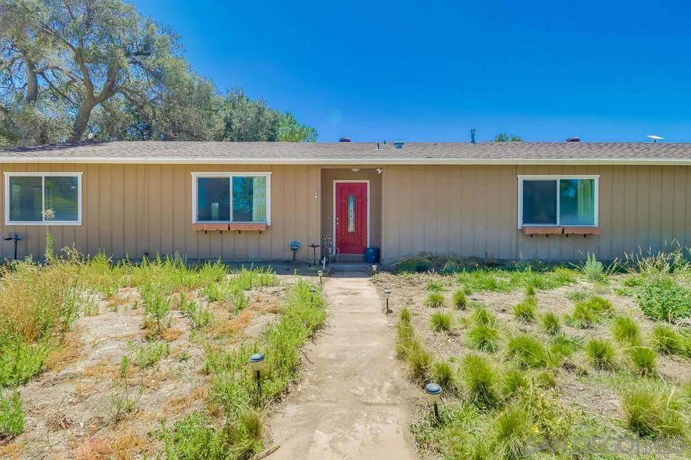 2920 Ribbonwood Road Boulevard, CA 91905 - Photo 6 of 65 a front view of house with yard