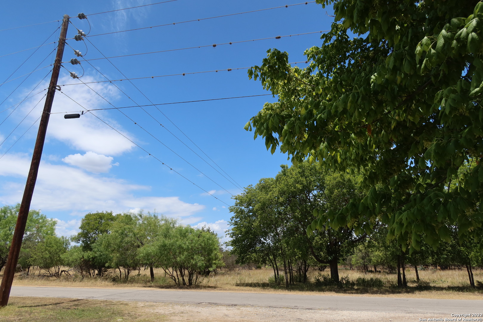 Tbd Cypress Bandera, TX 78003 - Photo 2 of 12 a view of a yard