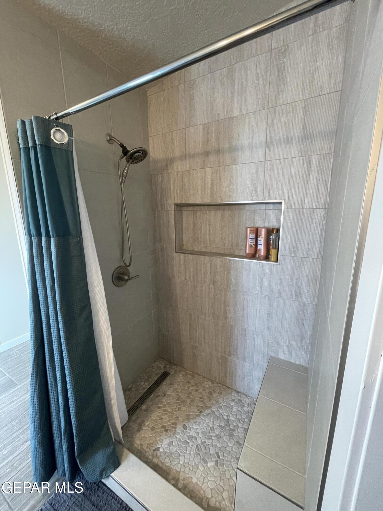 2901 Cook Street Truth Or Consequences, NM 87901 - Photo 15 of 28 a bathroom with a shower