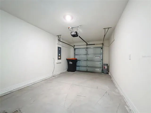 a view of a balcony with outdoor seating