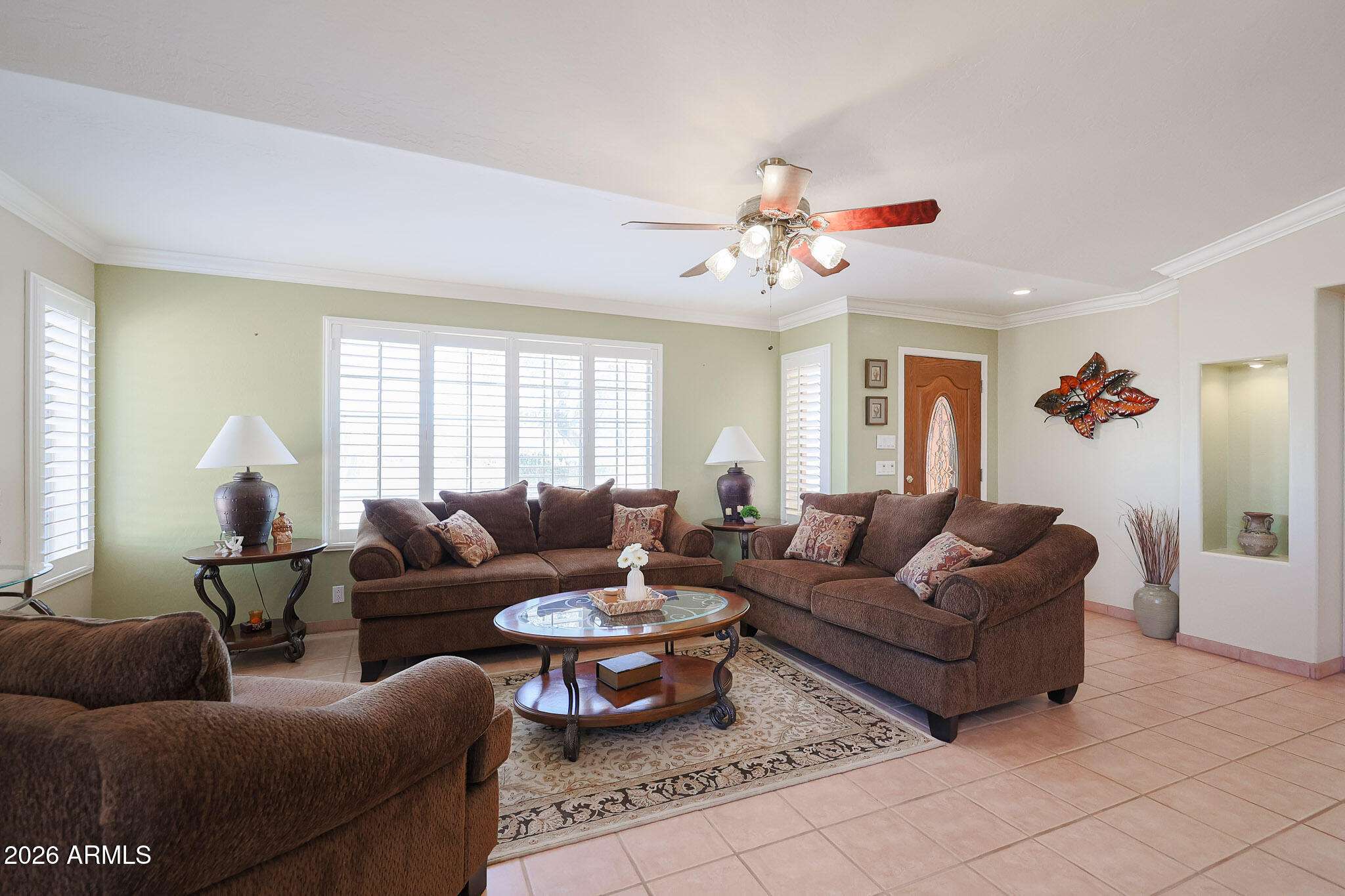 7344 North Alsup Road Litchfield Park, AZ 85340 - Photo 9 of 62 a living room with furniture and a large window