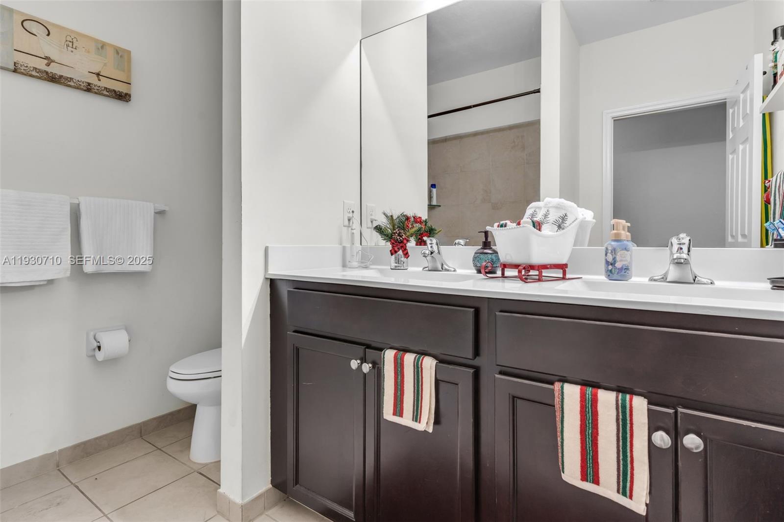 11424 Southwest 251st Street Homestead, FL 33032 - Photo 20 of 43 a bathroom with a sink and a toilet