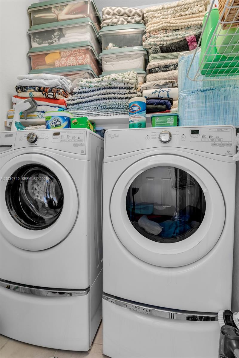 11424 Southwest 251st Street Homestead, FL 33032 - Photo 22 of 43 a utility room with washer and dryer