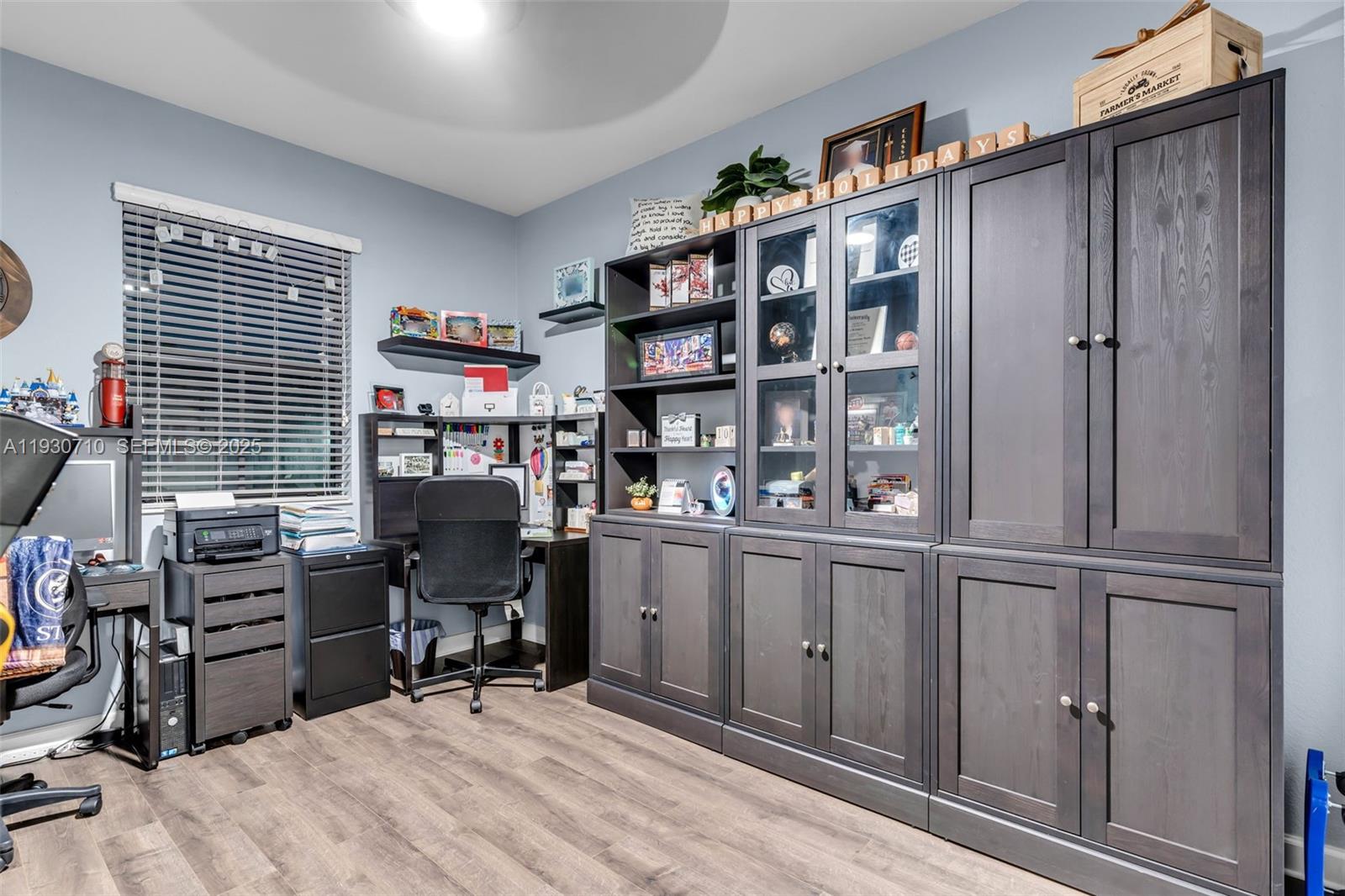 11424 Southwest 251st Street Homestead, FL 33032 - Photo 23 of 43 a room with cabinets