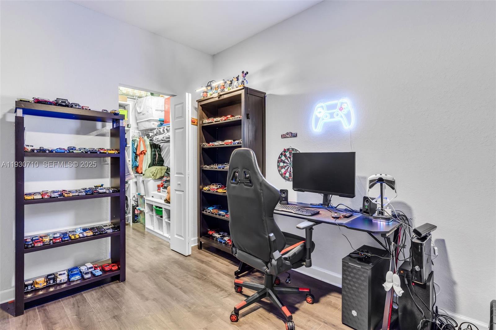 11424 Southwest 251st Street Homestead, FL 33032 - Photo 26 of 43 a view of a workspace with furniture and a window