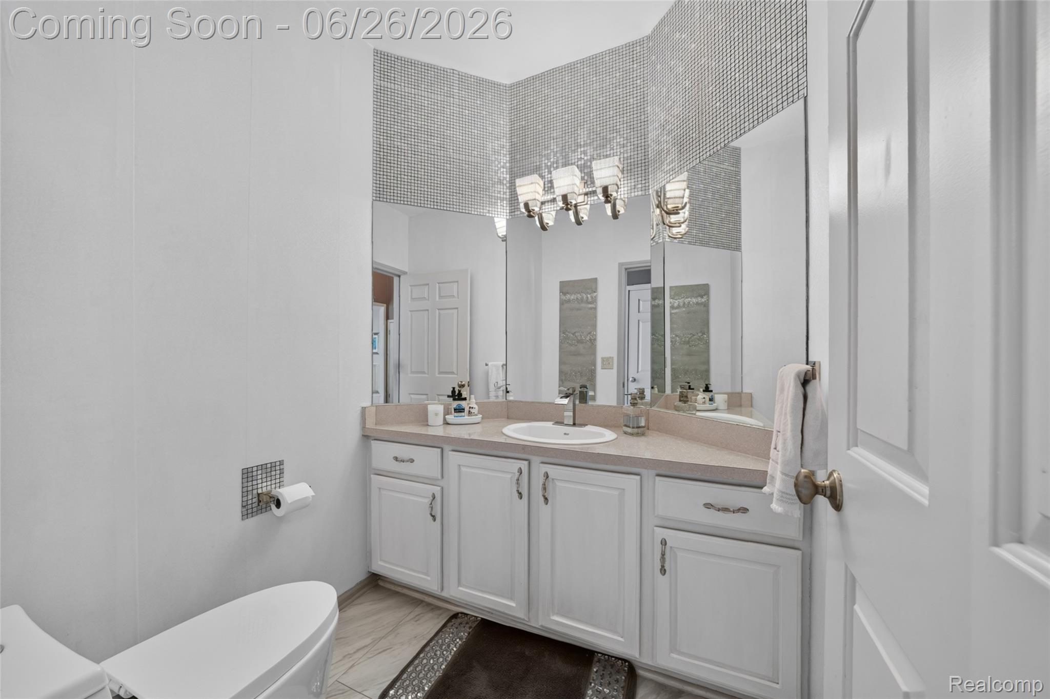 2619 Lambeth Park Rochester, MI 48306 - Photo 16 of 71 Bathroom vanity with white cabinetry and a built-in sink