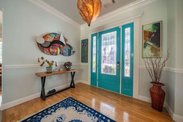 a bathroom with a double vanity sink toilet and shower